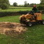 Stump removal with wheeled grinder 